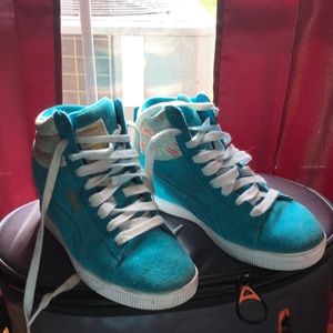 Blue puma high tops